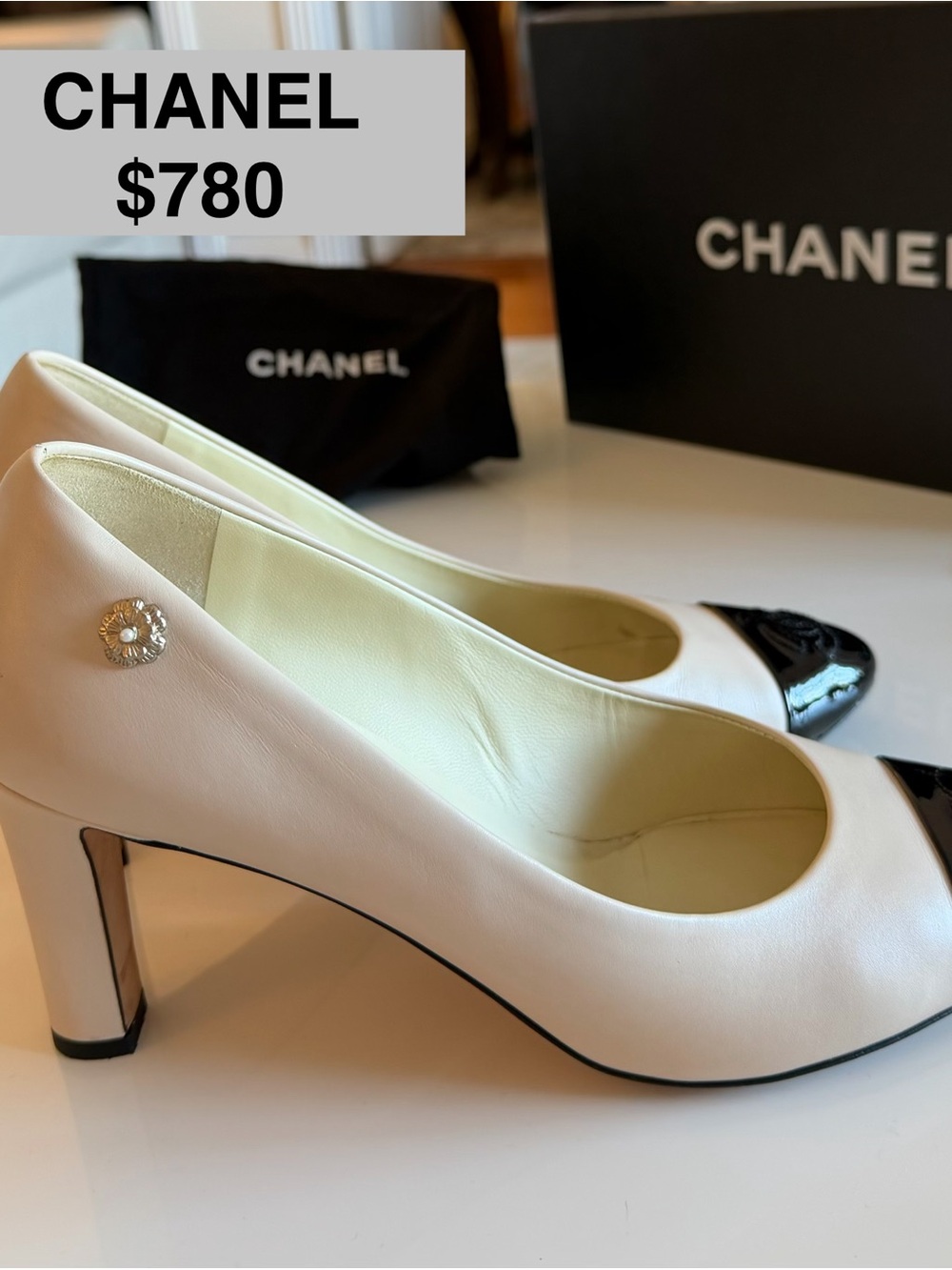CHANEL Two-Tone Ivory Leather Pumps with Black Patent Cap Toe